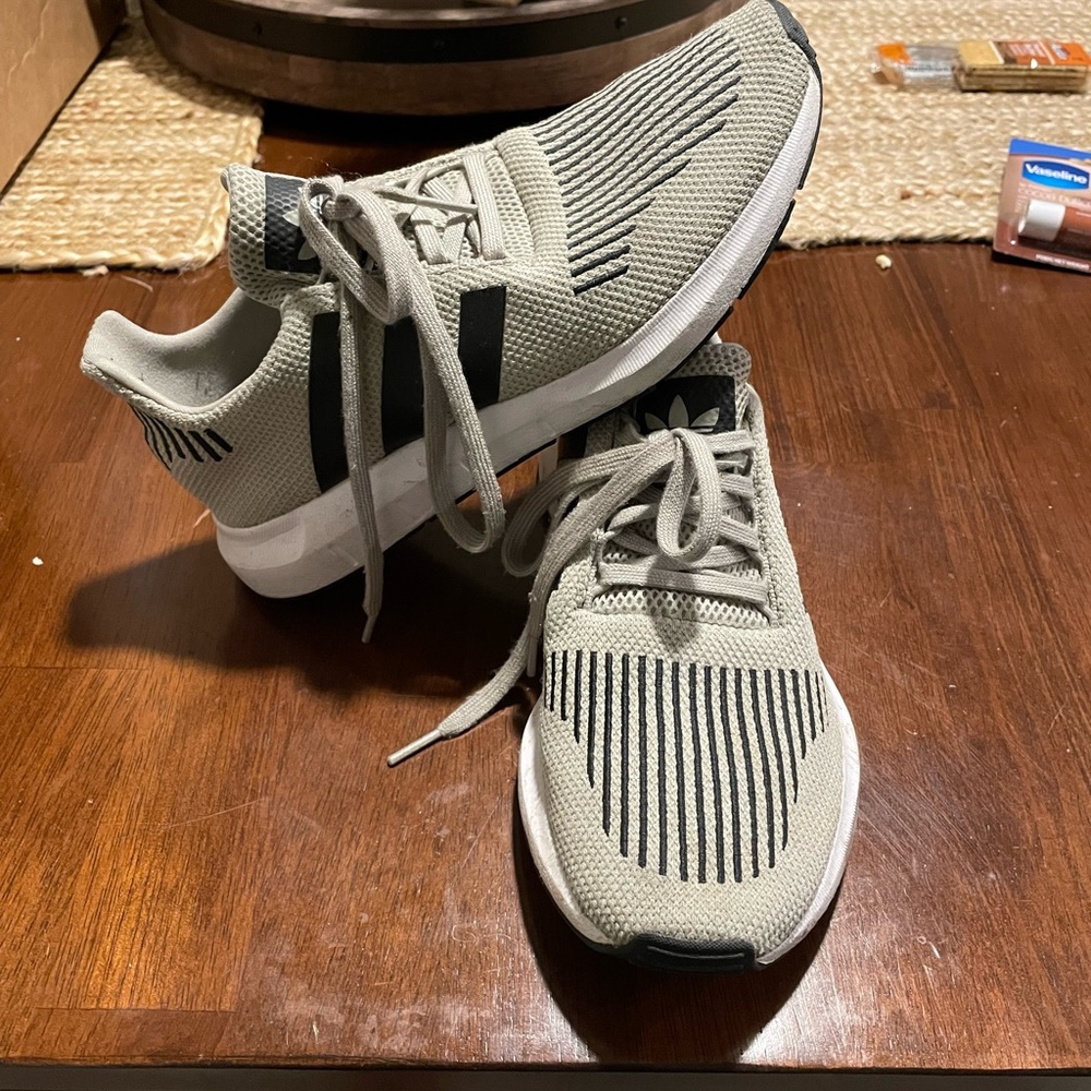 Adidas tan tennis shoes. Mens size 7, womens size 8.5 or 9